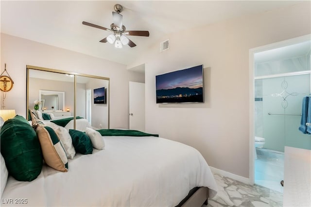 2093 Seahurst Dr, Las Vegas, NV 89142 - bedroom featuring marble look tiles, a closet, ensuite bath, and ceiling fan