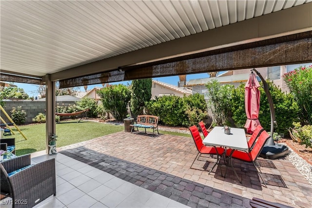 2093 Seahurst Dr, Las Vegas, NV 89142 - fenced backyard with a patio area and outdoor dining area