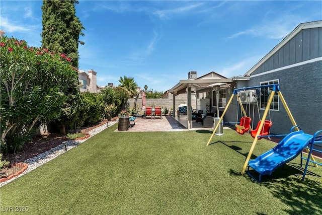 2093 Seahurst Dr, Las Vegas, NV 89142 - fenced backyard with a playground and a patio area