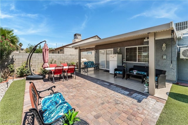 2093 Seahurst Dr, Las Vegas, NV 89142 - view of patio featuring outdoor lounge area, outdoor dining area, and area for grilling
