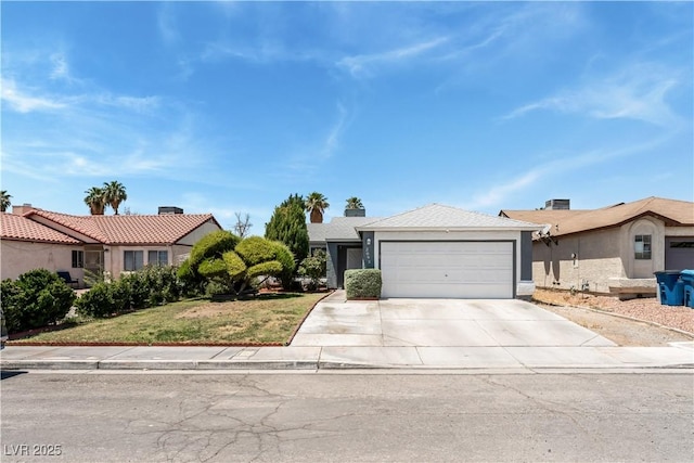 2093 Seahurst Dr, Las Vegas, NV 89142 - ranch-style home with concrete driveway, an attached garage, and a front yard
