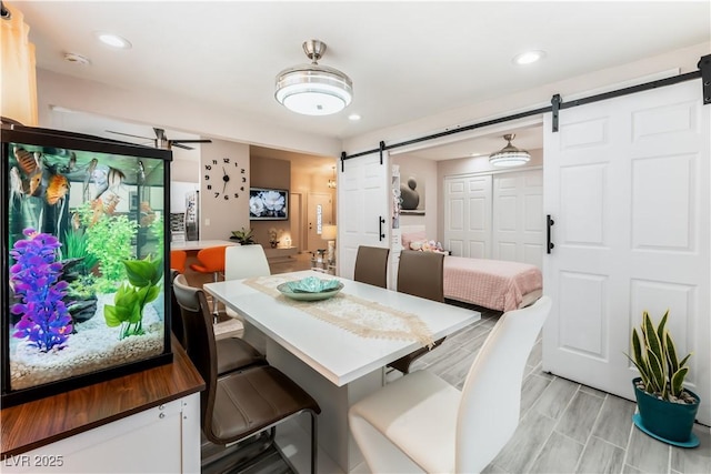 2093 Seahurst Dr, Las Vegas, NV 89142 - dining space featuring a barn door and recessed lighting