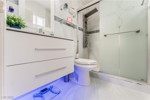 2093 Seahurst Dr, Las Vegas, NV 89142 - bathroom featuring a shower stall, vanity, and tile patterned flooring