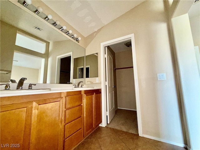 5517 Overlook Valley St, North Las Vegas, NV 89081 - bathroom with double vanity and tile patterned floors