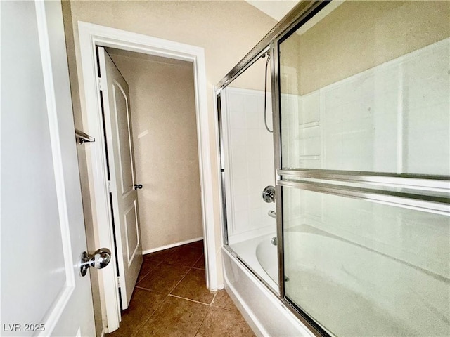 5517 Overlook Valley St, North Las Vegas, NV 89081 - bathroom featuring shower / bath combination with glass door and tile patterned floors