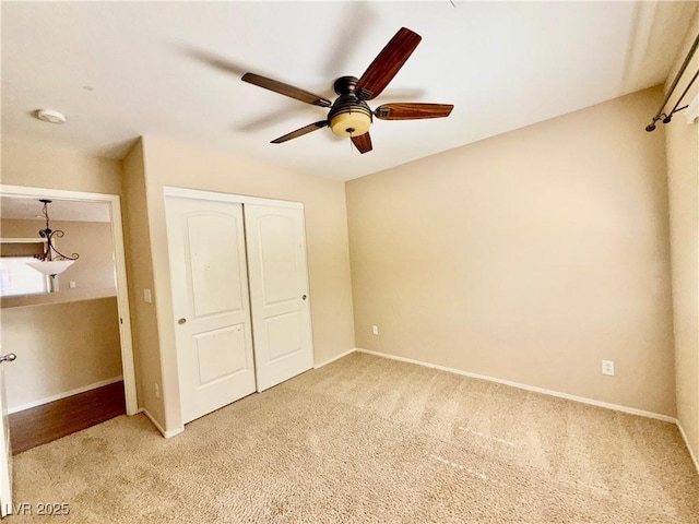 5517 Overlook Valley St, North Las Vegas, NV 89081 - unfurnished bedroom featuring carpet, a closet, and a ceiling fan