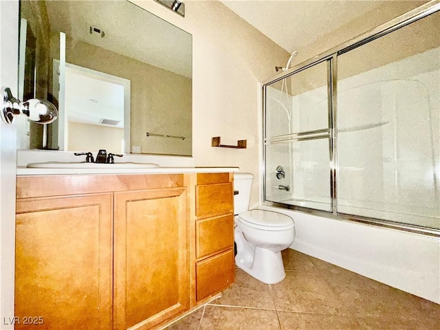 5517 Overlook Valley St, North Las Vegas, NV 89081 - bathroom with vanity, tile patterned flooring, and enclosed tub / shower combo