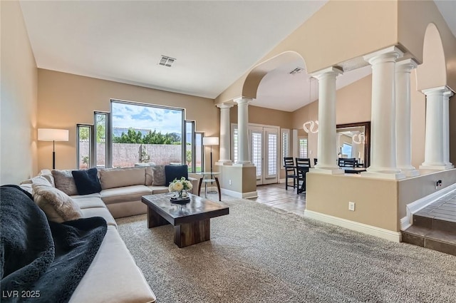 7404 Wittig Ave, Las Vegas, NV 89131 - living room with carpet flooring, high vaulted ceiling, and decorative columns