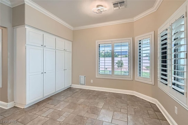 7404 Wittig Ave, Las Vegas, NV 89131 - unfurnished bedroom featuring light stone finish floors, crown molding, and a closet
