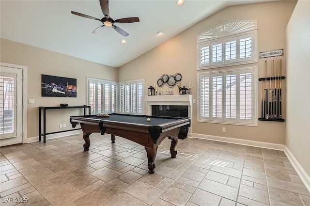 7404 Wittig Ave, Las Vegas, NV 89131 - playroom featuring ceiling fan, pool table, a glass covered fireplace, high vaulted ceiling, and recessed lighting