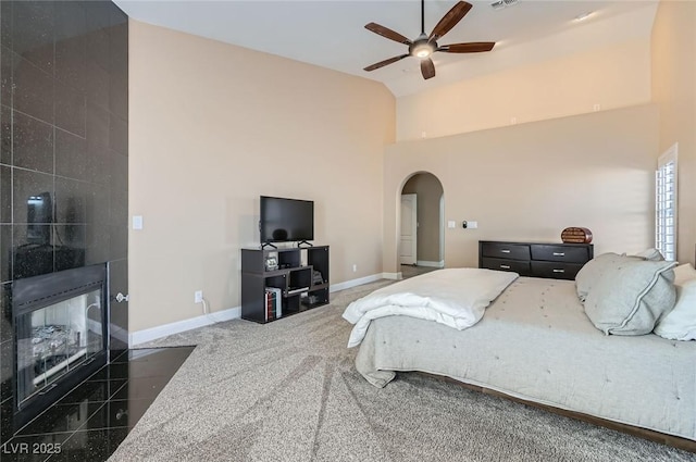 7404 Wittig Ave, Las Vegas, NV 89131 - bedroom featuring arched walkways, high vaulted ceiling, and ceiling fan