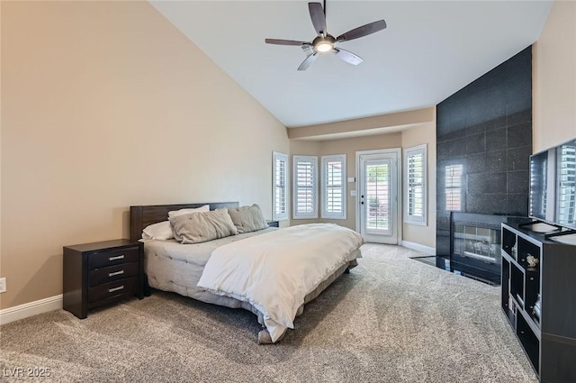7404 Wittig Ave, Las Vegas, NV 89131 - bedroom with access to outside, light colored carpet, vaulted ceiling, and a ceiling fan