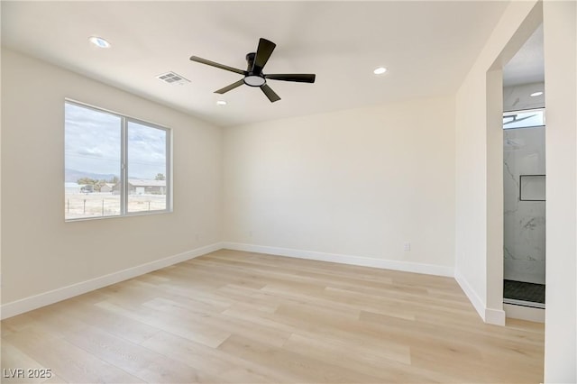 2461 S Blagg Rd, Pahrump, NV 89048 - unfurnished room featuring light wood-type flooring, ceiling fan, and recessed lighting