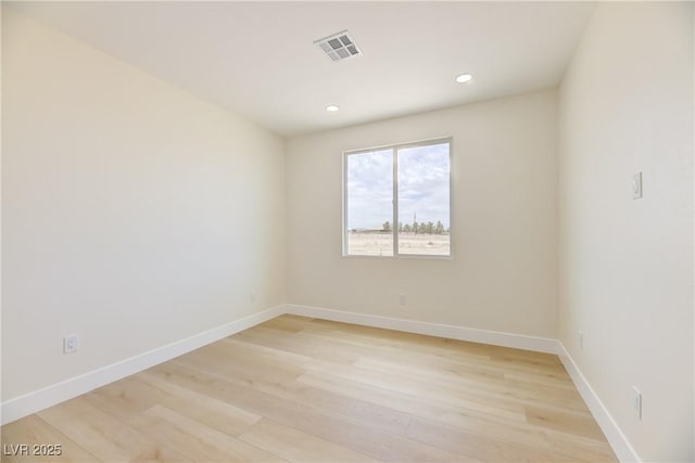 2461 S Blagg Rd, Pahrump, NV 89048 - spare room featuring light wood-style flooring and recessed lighting