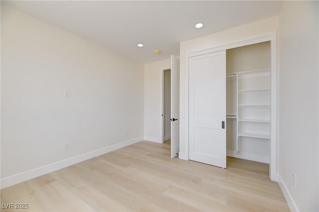 2461 S Blagg Rd, Pahrump, NV 89048 - unfurnished bedroom with light wood-type flooring, a closet, and recessed lighting