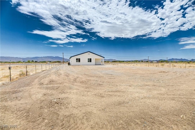 2461 S Blagg Rd, Pahrump, NV 89048 - view of yard featuring a mountain view and a view of rural / pastoral area