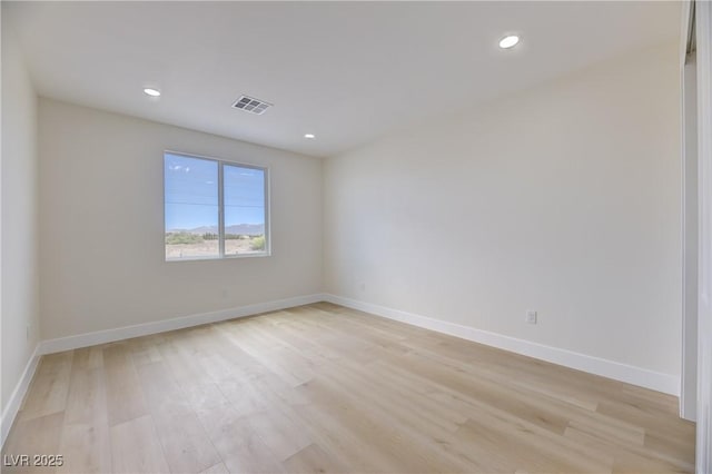 2461 S Blagg Rd, Pahrump, NV 89048 - empty room featuring light wood-type flooring and recessed lighting