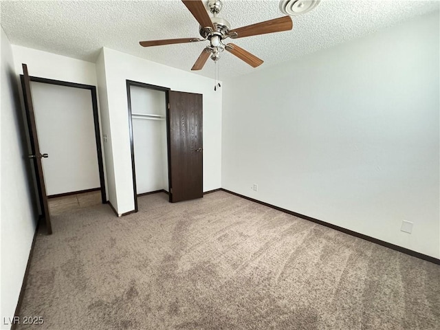 4303 Paramount St, Las Vegas, NV 89115 - unfurnished bedroom with light colored carpet, a textured ceiling, a closet, and ceiling fan