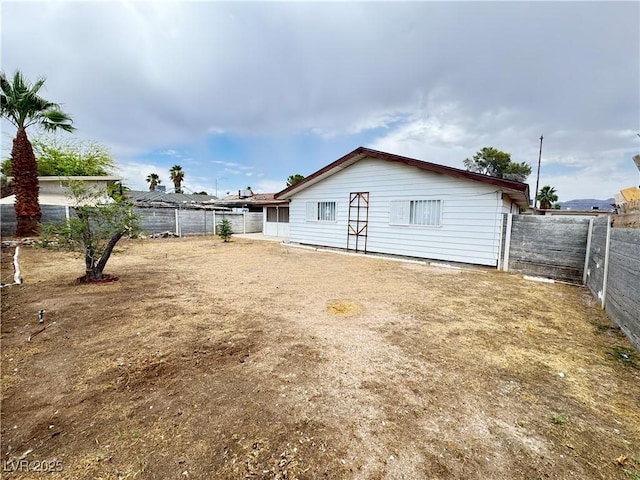 4303 Paramount St, Las Vegas, NV 89115 - back of property featuring a fenced backyard