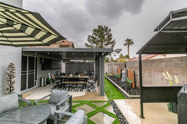 640 Thornewood Pl, Las Vegas, NV 89123 - fenced backyard featuring a patio area and outdoor dining area