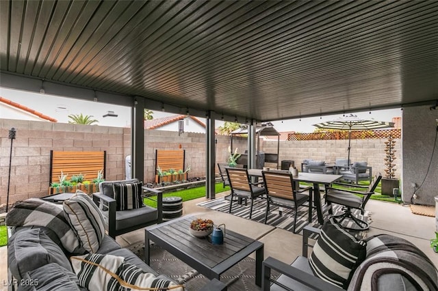 640 Thornewood Pl, Las Vegas, NV 89123 - fenced backyard with outdoor dining area, an outdoor living space, and a patio