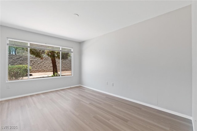 5710 E Tropicana Ave Unit 1184, Las Vegas, NV 89122 - empty room featuring wood finished floors