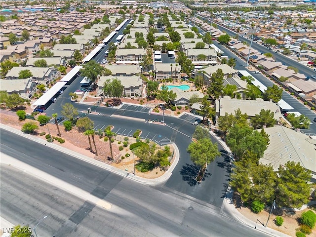 5710 E Tropicana Ave Unit 1184, Las Vegas, NV 89122 - aerial view of property and surrounding area featuring nearby suburban area and a pool
