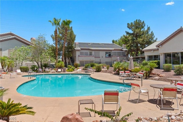 5710 E Tropicana Ave Unit 1184, Las Vegas, NV 89122 - community pool featuring a patio