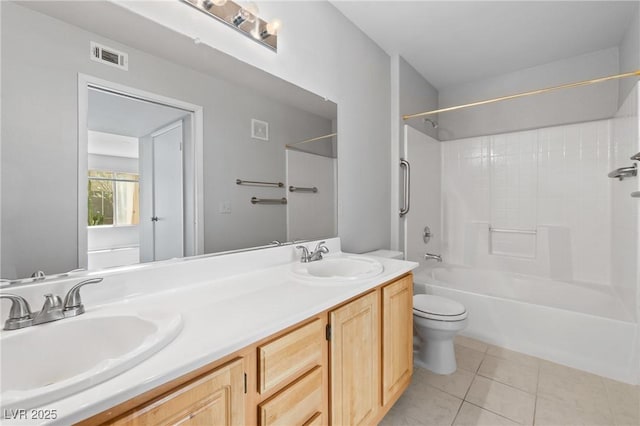5710 E Tropicana Ave Unit 1184, Las Vegas, NV 89122 - full bath featuring double vanity, tile patterned flooring, and shower / washtub combination