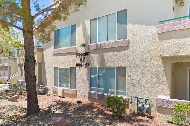5710 E Tropicana Ave Unit 1184, Las Vegas, NV 89122 - back of house featuring stucco siding