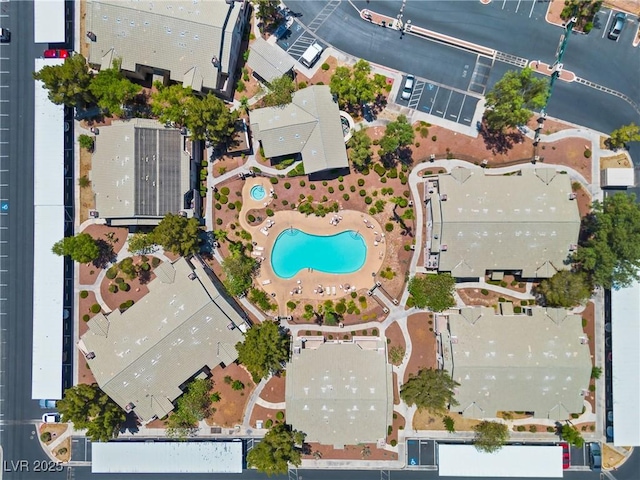 5710 E Tropicana Ave Unit 1184, Las Vegas, NV 89122 - aerial view of property and surrounding area with a pool