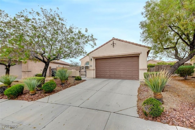 2766 Mintlaw Ave, Henderson, NV 89044 - view of front of house featuring stucco siding, concrete driveway, a gate, and an attached garage