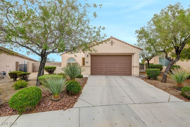 2766 Mintlaw Ave, Henderson, NV 89044 - mediterranean / spanish-style home featuring driveway, an attached garage, and stucco siding