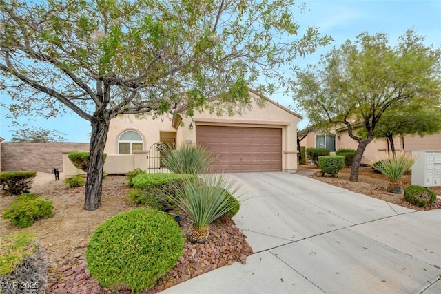 2766 Mintlaw Ave, Henderson, NV 89044 - view of front of property featuring concrete driveway, an attached garage, and stucco siding