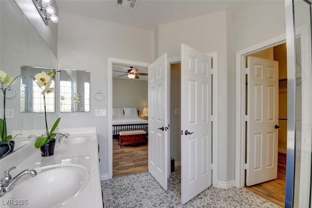 2766 Mintlaw Ave, Henderson, NV 89044 - full bathroom featuring double vanity, ceiling fan, and ensuite bath
