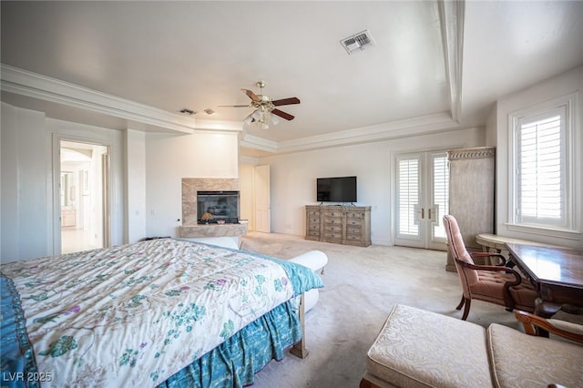 8925 Wild Creek Ct, Las Vegas, NV 89117 - bedroom with a raised ceiling, access to exterior, carpet floors, french doors, and a premium fireplace