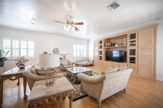 8925 Wild Creek Ct, Las Vegas, NV 89117 - living room with a ceiling fan, light wood-style flooring, and ornamental molding
