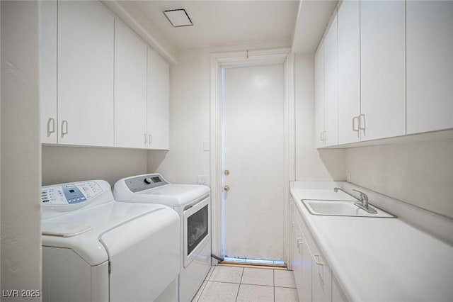 8925 Wild Creek Ct, Las Vegas, NV 89117 - washroom featuring washing machine and clothes dryer, cabinet space, and light tile patterned floors