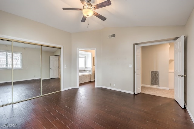 56 Westheimer Rd, Henderson, NV 89074 - unfurnished bedroom with lofted ceiling, dark wood finished floors, a closet, and a ceiling fan