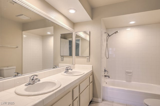 56 Westheimer Rd, Henderson, NV 89074 - bathroom featuring double vanity, shower / washtub combination, tile patterned flooring, and recessed lighting