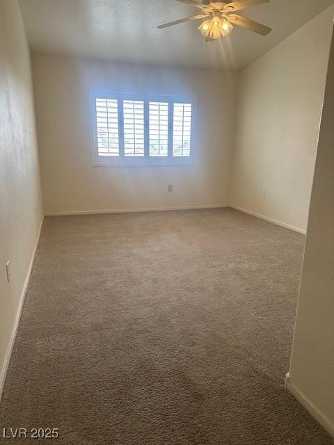 2110 Los Feliz St Unit 2091, Las Vegas, NV 89156 - empty room with carpet flooring and ceiling fan