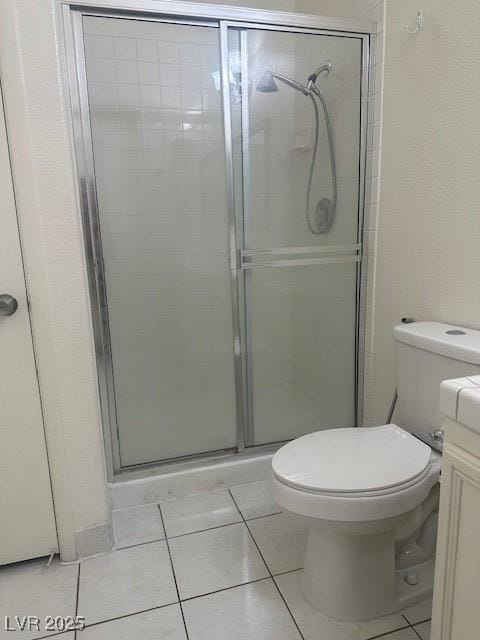 2110 Los Feliz St Unit 2091, Las Vegas, NV 89156 - full bathroom with a shower stall, vanity, and tile patterned flooring