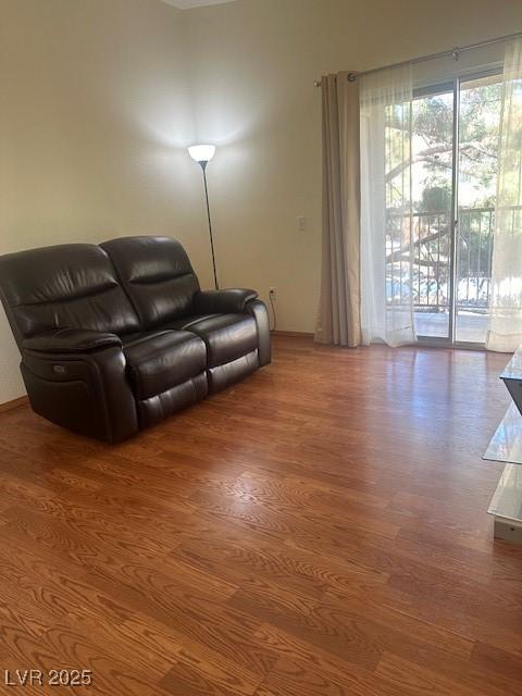 2110 Los Feliz St Unit 2091, Las Vegas, NV 89156 - living room with wood finished floors