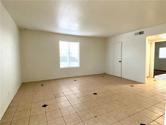 4980 Apollostar Ct, Las Vegas, NV 89115 - empty room featuring light tile patterned floors