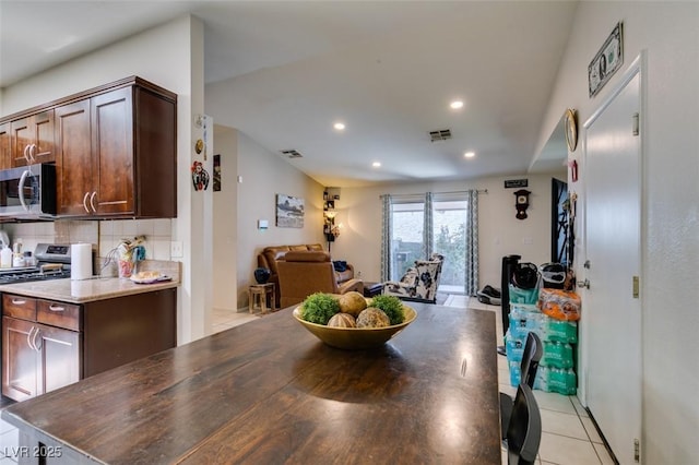1949 King Hill St, Las Vegas, NV 89106 - dining area with recessed lighting and light tile patterned flooring