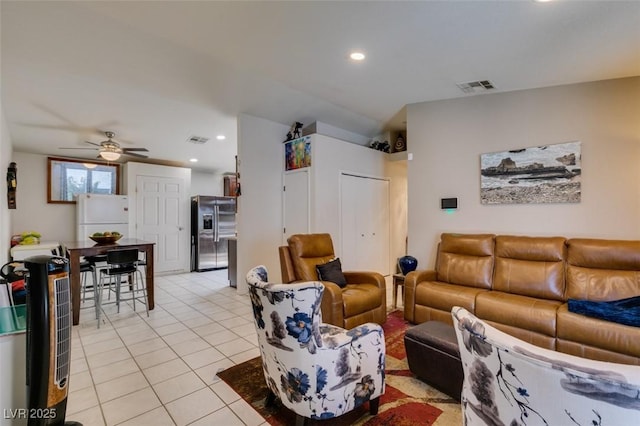 1949 King Hill St, Las Vegas, NV 89106 - living room with light tile patterned floors, recessed lighting, and a ceiling fan