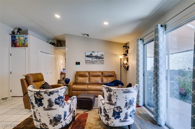 1949 King Hill St, Las Vegas, NV 89106 - living room with lofted ceiling, light tile patterned floors, and recessed lighting