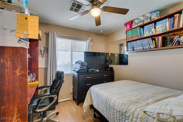 1949 King Hill St, Las Vegas, NV 89106 - bedroom featuring wood finished floors, a desk, and a ceiling fan