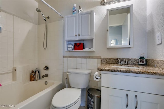 1949 King Hill St, Las Vegas, NV 89106 - full bath featuring vanity, shower / bathtub combination, tile walls, and wainscoting