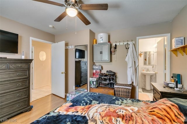 1949 King Hill St, Las Vegas, NV 89106 - bedroom with light wood-type flooring, a ceiling fan, and ensuite bath